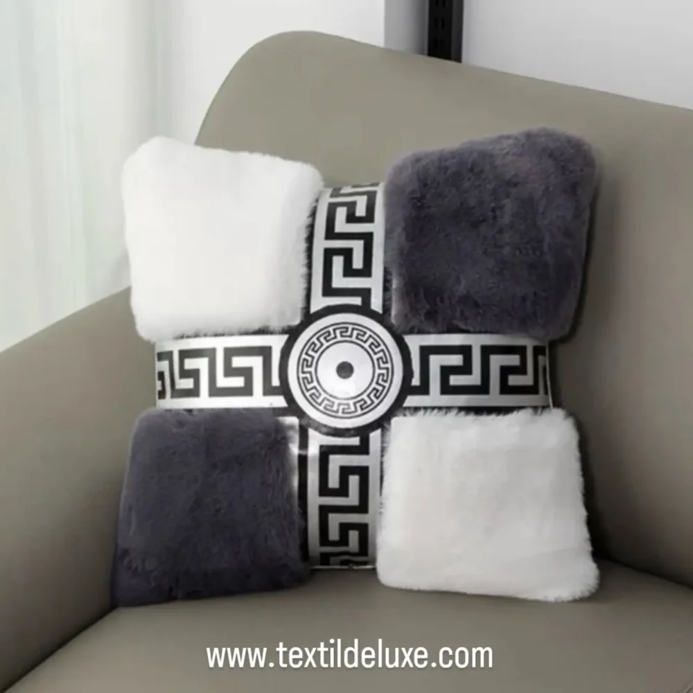 cojín decorativo combina cuatro paneles de piel sintética o pelo suave en blanco y gris/negro